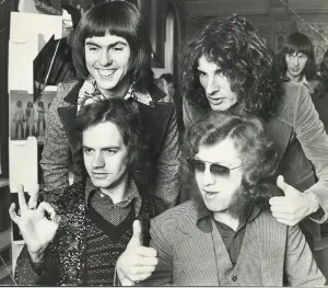 Thumbs up from the Black Country rock group Slade. 24/02/1975 Top - Dave Hill Thumbs up from the Black Country rock group Slade. 24/02/1975 Top - Dave Hill