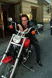 Tico Torres Drummer of Pop Group Bon Jovi and boyfriend of supermodel Eva Herzagova sits Tico Torres Drummer of Pop Group Bon Jovi and boyfriend of supermodel Eva Herzagova sits