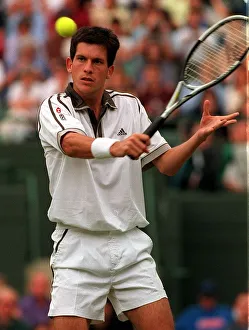 Tim Henman Wimbledon Tennis Championships 1999 Tim Henman volleys against the net in his Tim Henman Wimbledon Tennis Championships 1999 Tim Henman volleys against the net in his