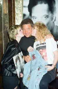 Tom Jones poses with fans Kathy Hall and Rosina Sims at HMV Oxford Street Tom Jones poses with fans Kathy Hall and Rosina Sims at HMV Oxford Street