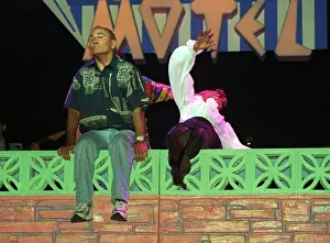 TOMMY CANNON sits on wall as SHEILA FERGUSON falls backwards BLACKPOOL Rock with Laughter TOMMY CANNON sits on wall as SHEILA FERGUSON falls backwards BLACKPOOL Rock with Laughter