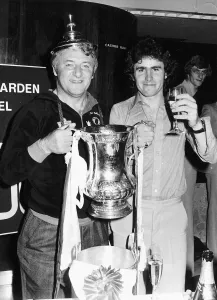 Tommy Docherty Football Manager holding FA Cup with the lid on his head Tommy Docherty Football Manager holding FA Cup with the lid on his head