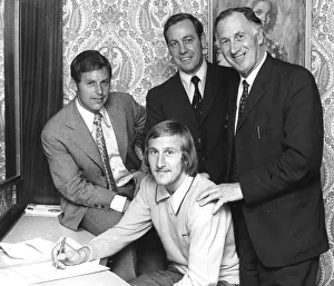 Tommy Hutchison signs for Coventry City in his bedroom at the Hotel Leofric on his Tommy Hutchison signs for Coventry City in his bedroom at the Hotel Leofric on his