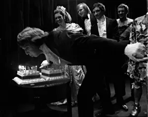 Tommy Steele 1975 blowing out candles on cake Tommy Steele 1975 blowing out candles on cake