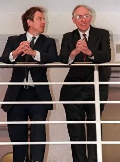 Images Dated 8th April 1999: Tony Blair looks sideways at Donald Dewar April 1999 leaning on railings at the new