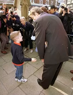 Images Dated 27th September 1998: Tony Blair Prime Minister with George Bates Sept 1998 a shy six year old admirer at