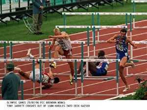 Tony Jarrett crashes out of the 110 Metre hurdles and into Erik Kaiser at the Olympic Tony Jarrett crashes out of the 110 Metre hurdles and into Erik Kaiser at the Olympic