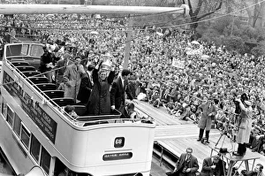 Tottenham Hotspur players parade the FA Cup trophy from the top of an open top double Tottenham Hotspur players parade the FA Cup trophy from the top of an open top double