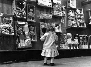 Toys: Dolls: Sheila Matton seen here in a little girls heavan looks at toy dolls in a Toys: Dolls: Sheila Matton seen here in a little girls heavan looks at toy dolls in a