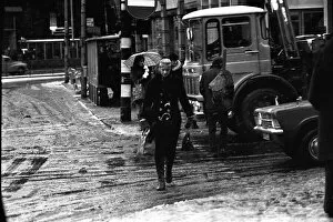 Images Dated 23rd November 1971: Traffic and pedestrains struggle against the snow on Grainger Street