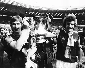 Trevor Brooking right and Kevin Locke hold the FA Cup Mafter beating Fulham in the FA Trevor Brooking right and Kevin Locke hold the FA Cup Mafter beating Fulham in the FA