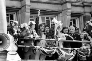 Triumphant West Ham captain Billy Bonds with players as they parade the FA cup trophy to Triumphant West Ham captain Billy Bonds with players as they parade the FA cup trophy to