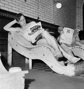 Turkish bath assistant Ernest Smith reading his newspaper. January 1953 D259 Turkish bath assistant Ernest Smith reading his newspaper. January 1953 D259