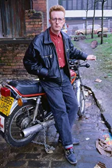 TV presenter Bryan Burnett sitting on motorcycle 1990 TV presenter Bryan Burnett sitting on motorcycle 1990
