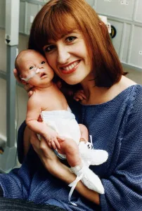 TV presenter Jackie Bird holding her baby Jacob March 1995 TV presenter Jackie Bird holding her baby Jacob March 1995