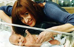 TV presenter Jackie Bird holding her baby March 1995 TV presenter Jackie Bird holding her baby March 1995