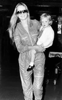 Twiggy actress and model with 21 month old daughter at Heathrow airport. July 1980 Twiggy actress and model with 21 month old daughter at Heathrow airport. July 1980