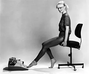 The Typewriter:- Using portable typewriter, place on floor The Typewriter:- Using portable typewriter, place on floor