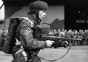 A typical paratroop of Airborne Forces, complete with rubber crash helmet A typical paratroop of Airborne Forces, complete with rubber crash helmet