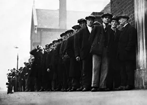 Unemployed men seen here queueing up at the Labour Exchange in the Midlands Unemployed men seen here queueing up at the Labour Exchange in the Midlands