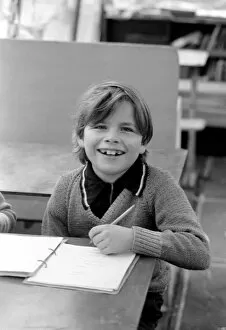 Images Dated 22nd December 1976: Unusual: Children. Fire Eater. 9 year old Tony Walls. Tony Walls at his studies in