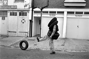 Unusual/Man/Tyres/Humour/Comedy. All Tyred up Brighton Tyre Fitter Unusual/Man/Tyres/Humour/Comedy. All Tyred up Brighton Tyre Fitter