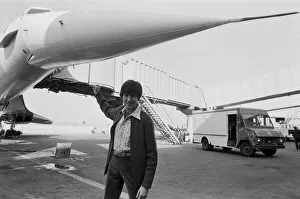 Uri Geller at London Airport standing in front of a Concorde. 1st November 1978 Uri Geller at London Airport standing in front of a Concorde. 1st November 1978