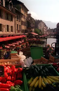 Vegetables in the street market overlooking the River running through the town of Annecy Vegetables in the street market overlooking the River running through the town of Annecy