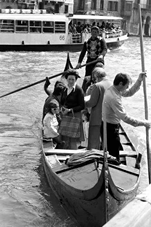 Venice, Italy Venetian's seen here going shopping by gondilas. April 1975 75-2202-013 Venice, Italy Venetian's seen here going shopping by gondilas. April 1975 75-2202-013