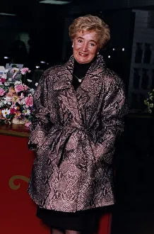 Vera Weisfeld in mock crock mini mac from new Weisfeld range of ladieswear Vera Weisfeld in mock crock mini mac from new Weisfeld range of ladieswear