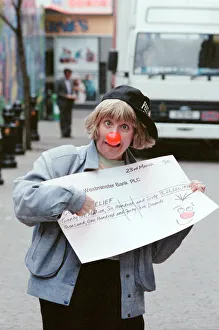 Victoria Wood with Comic Relief Red Nose and Cheque. 23rd March 1990 Victoria Wood with Comic Relief Red Nose and Cheque. 23rd March 1990