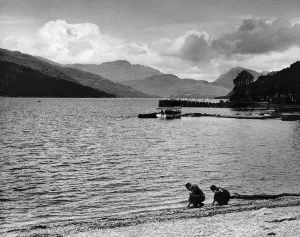 Views A pier on Loch Lomond boats people on shore Views A pier on Loch Lomond boats people on shore