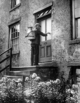 Village milkman George Wake doing his daily rounds in the Yorkshire Dales with his four Village milkman George Wake doing his daily rounds in the Yorkshire Dales with his four