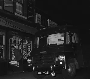 A W H Smith wholesale newsagents delivery driver seen here leaving the morning papers at A W H Smith wholesale newsagents delivery driver seen here leaving the morning papers at