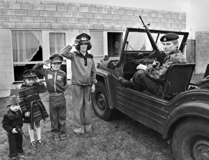 War relic enthusiast mum Monica leads the White army on parade for dad's inspection War relic enthusiast mum Monica leads the White army on parade for dad's inspection