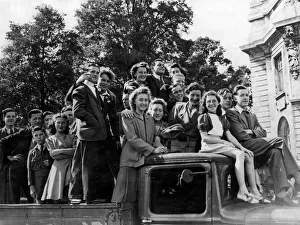 War - World War II - Yound people in Cardiff climb on board a lorry to use it as a War - World War II - Yound people in Cardiff climb on board a lorry to use it as a