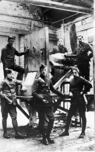 Warrant Officer Tom Guttery (centre) seen here in the test house of his workshop at an Warrant Officer Tom Guttery (centre) seen here in the test house of his workshop at an