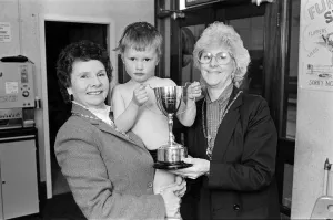 Water baby William receives his trophy from the Mayoress (left) and Deputy Mayoress Water baby William receives his trophy from the Mayoress (left) and Deputy Mayoress