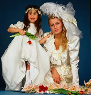 Images Dated 12th February 1987: Wedding dress fashion, February 1987 model wearing wedding dress sitting ground