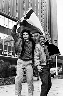 Welsh rock band Ceffyl Pren members Alun Wyn Davies and Jon Evvo fly the Welsh flag as Welsh rock band Ceffyl Pren members Alun Wyn Davies and Jon Evvo fly the Welsh flag as