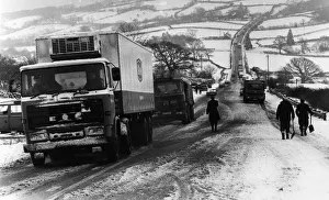 Welsh Weather 1979, Our picture shows... a long line of lorries queue to make the long Welsh Weather 1979, Our picture shows... a long line of lorries queue to make the long
