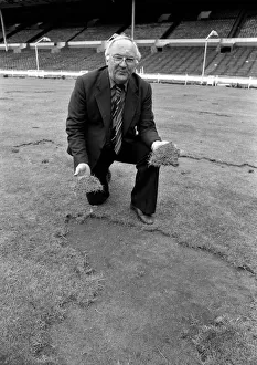 Wembley groundsman Don Gallacher inspects the damage cause by the Scottish fans following Wembley groundsman Don Gallacher inspects the damage cause by the Scottish fans following