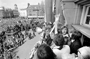 West Ham players including captain Billy Bonds show off the trophy to fans gathered below West Ham players including captain Billy Bonds show off the trophy to fans gathered below