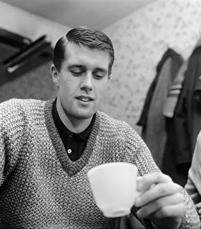 West Ham United footballer Geoff Hurst looks at the tea leaves for a prediction of his West Ham United footballer Geoff Hurst looks at the tea leaves for a prediction of his