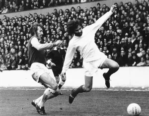 West Ham v Manchester United Billy Bonds of West Ham challenges George Best of West Ham v Manchester United Billy Bonds of West Ham challenges George Best of