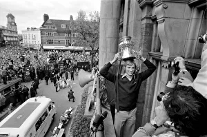 West Ham's Alan Taylor showing off the trophy to fans gathered below at Newham Town West Ham's Alan Taylor showing off the trophy to fans gathered below at Newham Town