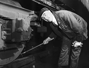 Wheel Tapper Bill Warden seen here walking the length of his train checking the wheels Wheel Tapper Bill Warden seen here walking the length of his train checking the wheels