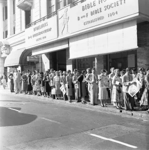 Whites only queue for a bus in Cape Town. 4th February 1955 Whites only queue for a bus in Cape Town. 4th February 1955