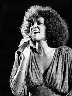 Whitney Houston performing at a concert October 1987 Whitney Houston performing at a concert October 1987