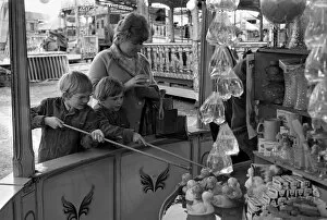 Images Dated 31st May 1971: The Whitsun Fair at Hearsall Common, Coventry. These two children try their luck hooking